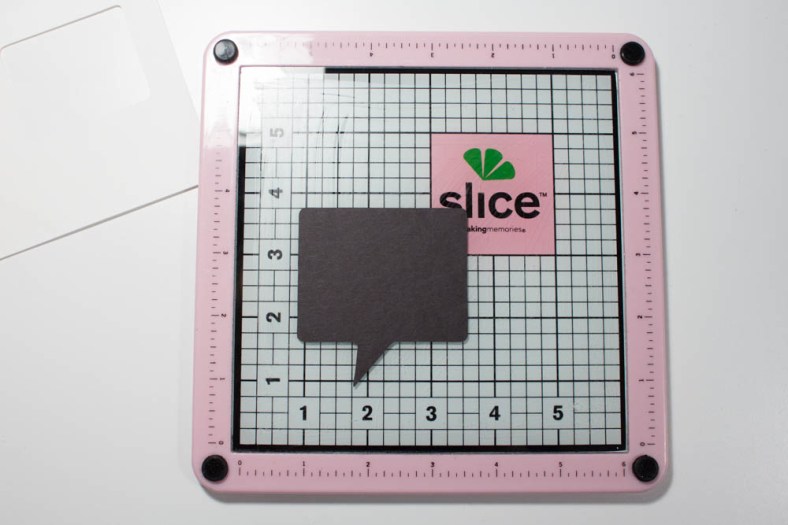 I removed the scrap paper and made certain my die-cut was firmly adhered to the cutting mat before making the cut.