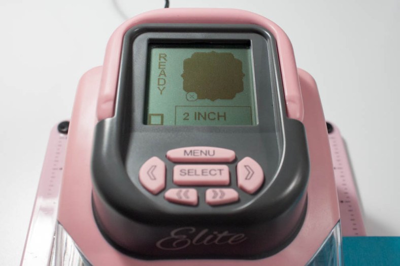 I then created another die-cut at 2 inches in pool-blue textured cardstock.