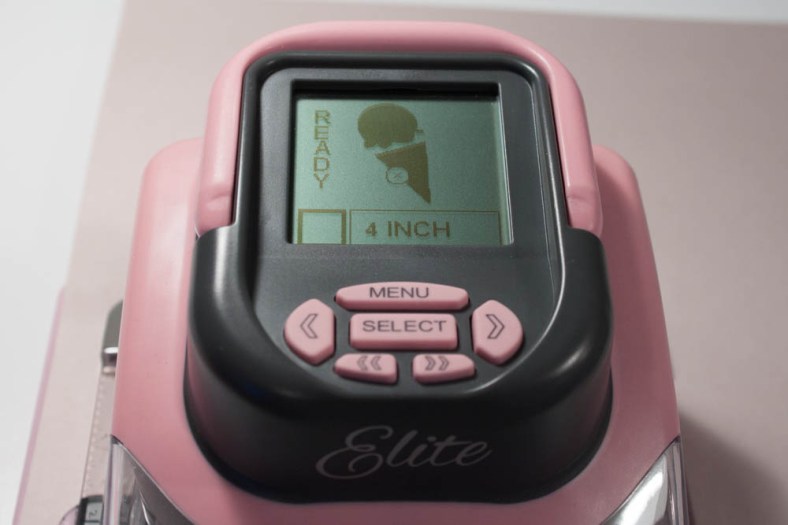 Using my Slice Elite and "Summer" design card, I die-cut a 4-inch ice-cream cone (it cuts the scoop and cone separately) in beige textured cardstock. I repeated the die-cut to create two light-pink scoops, two light-green scoops and an off-white scoop.